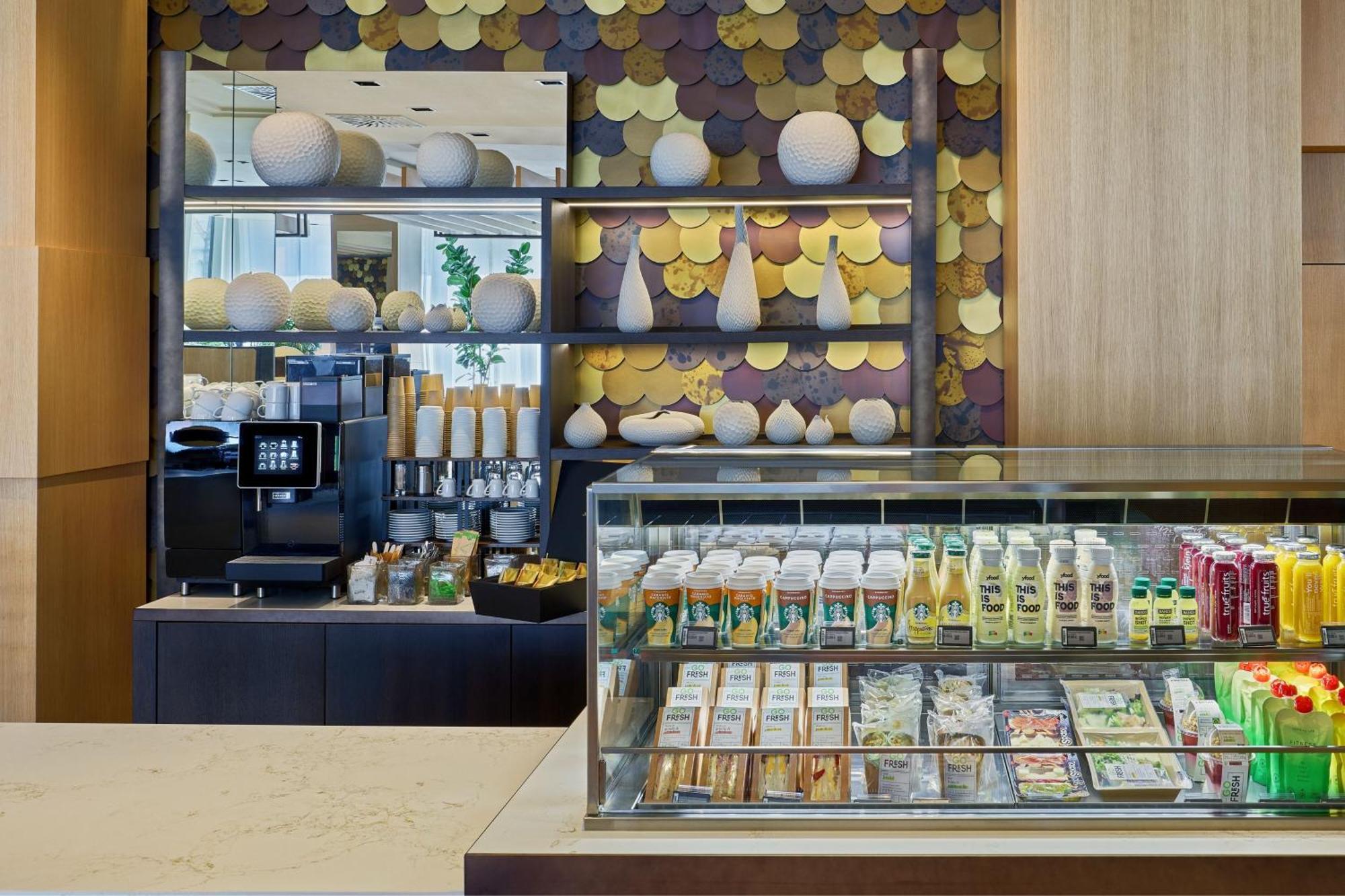 The Westin Grand Frankfurt Hotel Frankfurt am Main Exterior photo The coffee bar at the lobby
